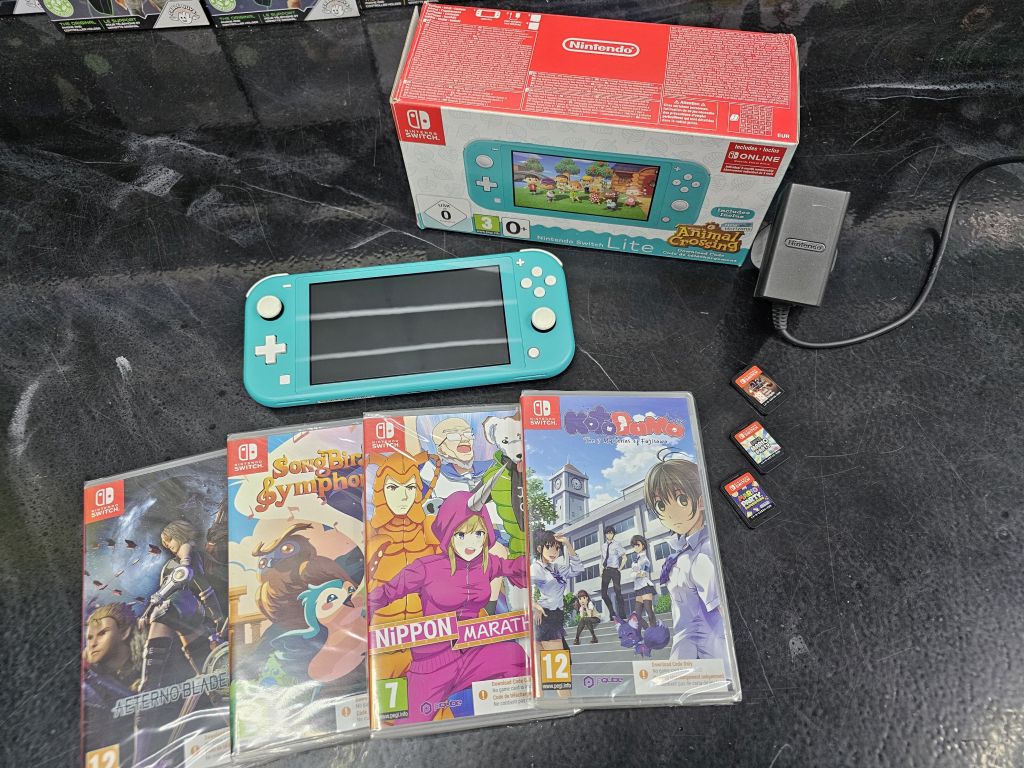 Używana Konsola Nintendo Switch Lite Turquoise / Turkusowa + 7 gier